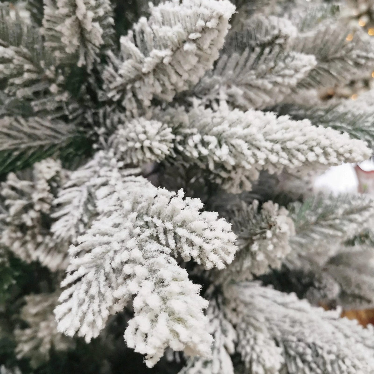 Flocking white Christmas tree